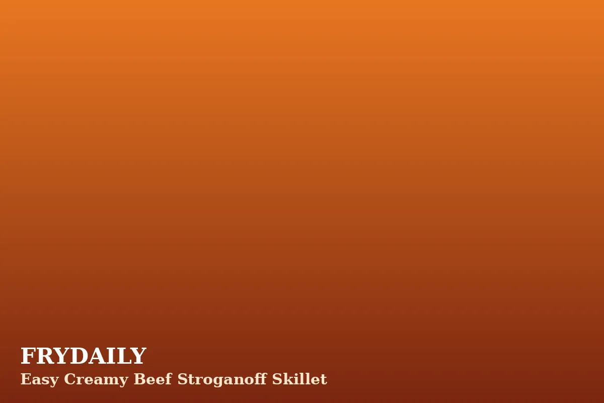 Creamy beef stroganoff skillet with sliced beef, mushrooms and egg noodles in a rich sauce, garnished with parsley
