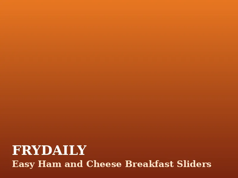 Easy ham and cheese breakfast sliders with scrambled eggs on soft rolls in a baking pan