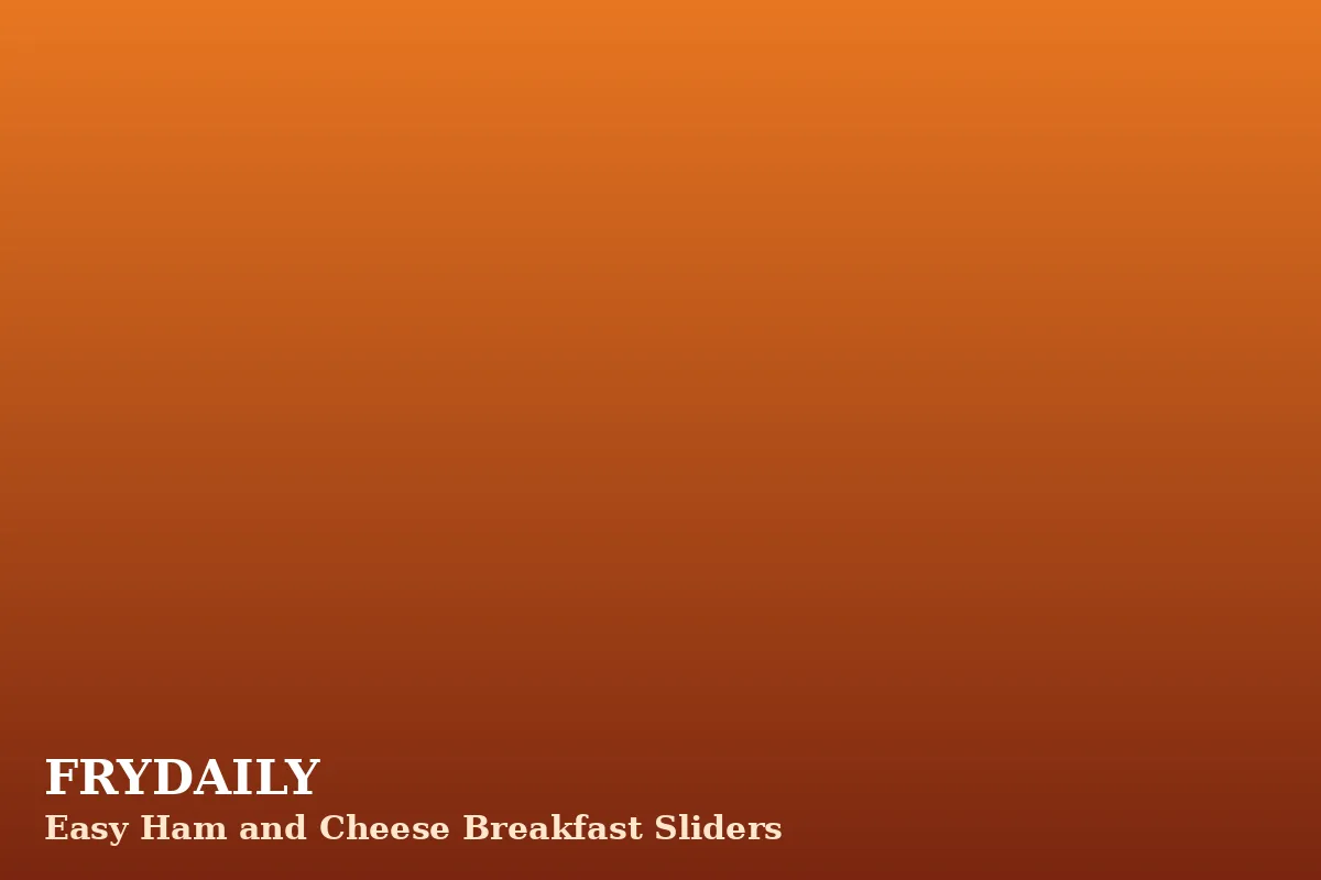 Easy ham and cheese breakfast sliders with scrambled eggs on soft rolls in a baking pan