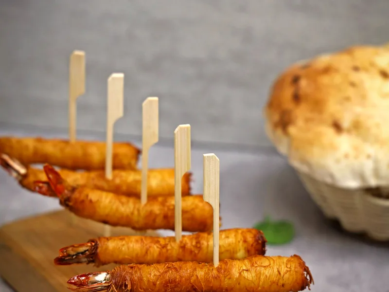 Crispy air fryer coconut shrimp with golden panko coconut crust and sweet chili dipping sauce