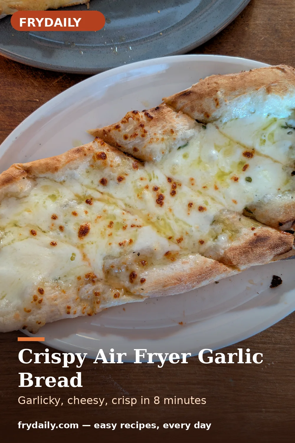 Pinterest pin: Crispy Air Fryer Garlic Bread recipe from FryDaily