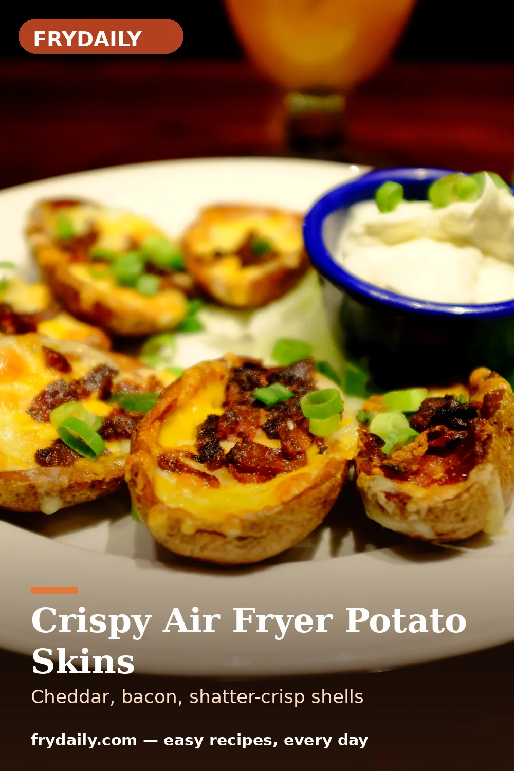 Pinterest pin: Crispy Air Fryer Potato Skins recipe from FryDaily