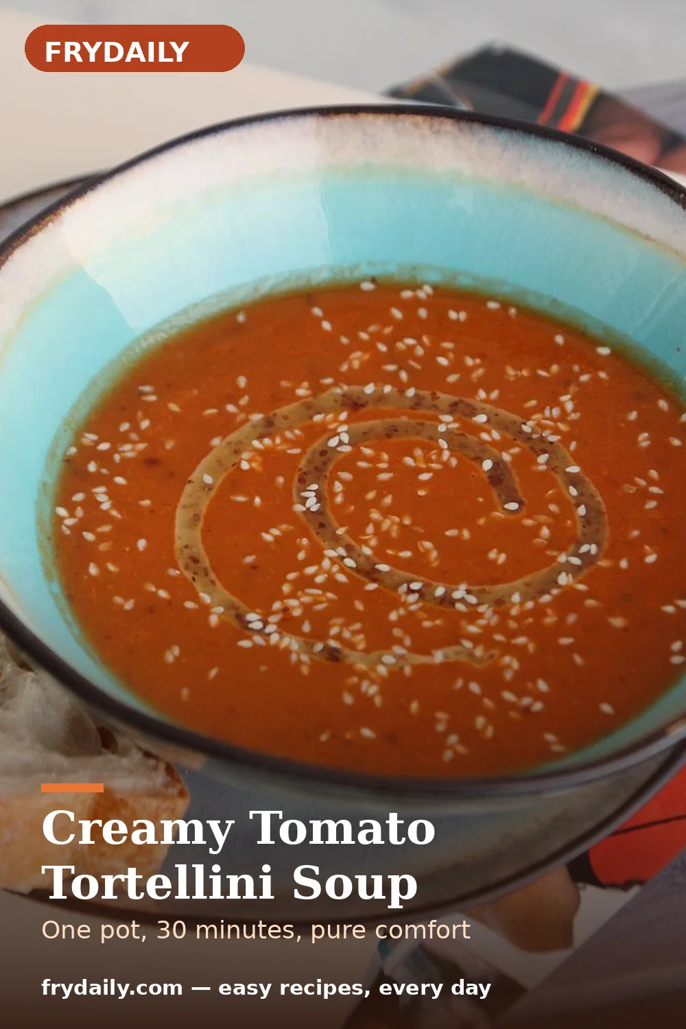 Pinterest pin: Creamy Tomato Tortellini Soup recipe from FryDaily