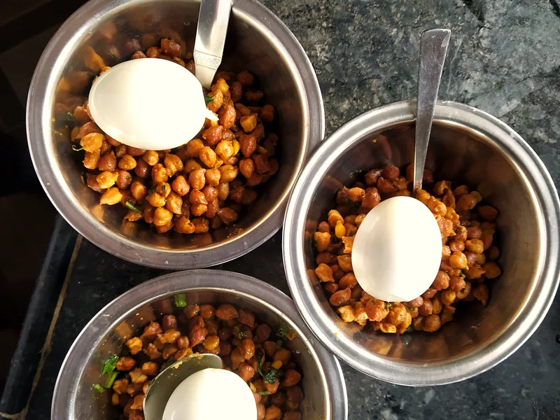 Crispy roasted chickpeas seasoned with paprika served in bowls as a crunchy snack