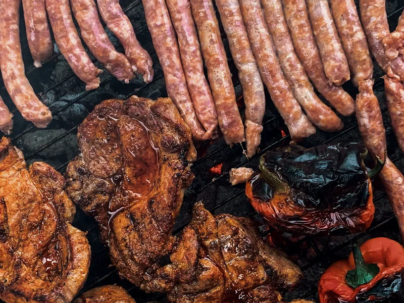 Roasted Italian sausages with sweet bell peppers and onions
