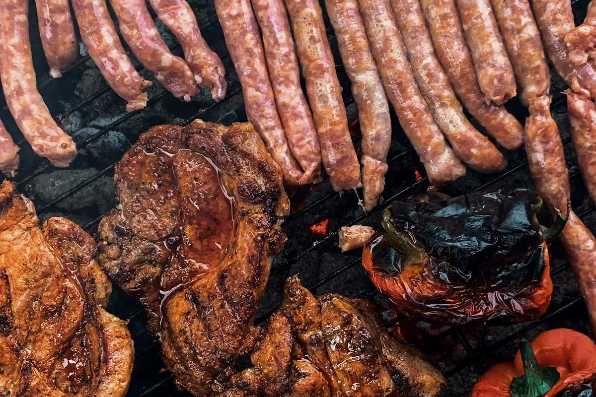 Roasted Italian sausages with sweet bell peppers and onions