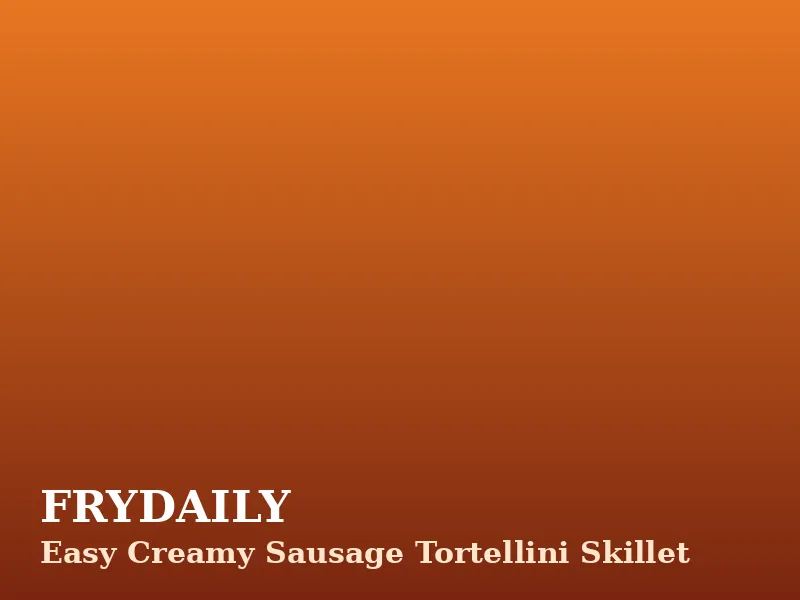 Easy creamy sausage tortellini skillet with cheese tortellini, browned sausage and spinach in a creamy tomato sauce