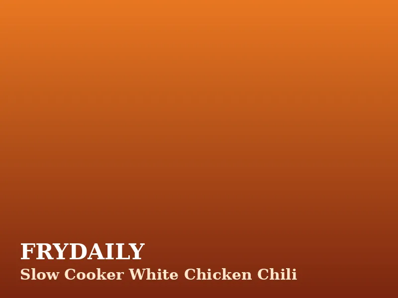 Slow cooker white chicken chili with shredded chicken, white beans, corn and a dollop of sour cream