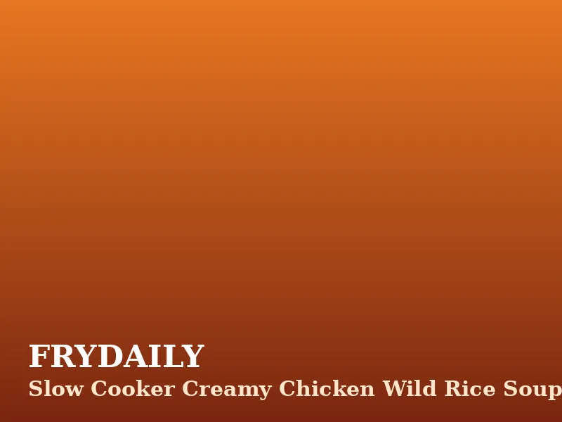 Slow cooker creamy chicken wild rice soup in a bowl with tender chicken, wild rice and carrots in a creamy broth